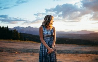 woman alone image with mountains background